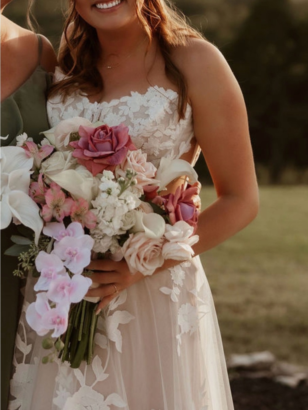 Maggie Sottero Lace A-line Gown with Pink and Cream Bouquet Accents
